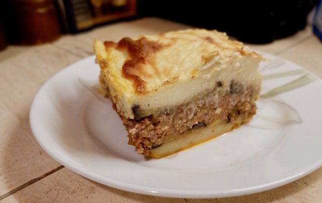 Baked moussaka with browned top in a dish