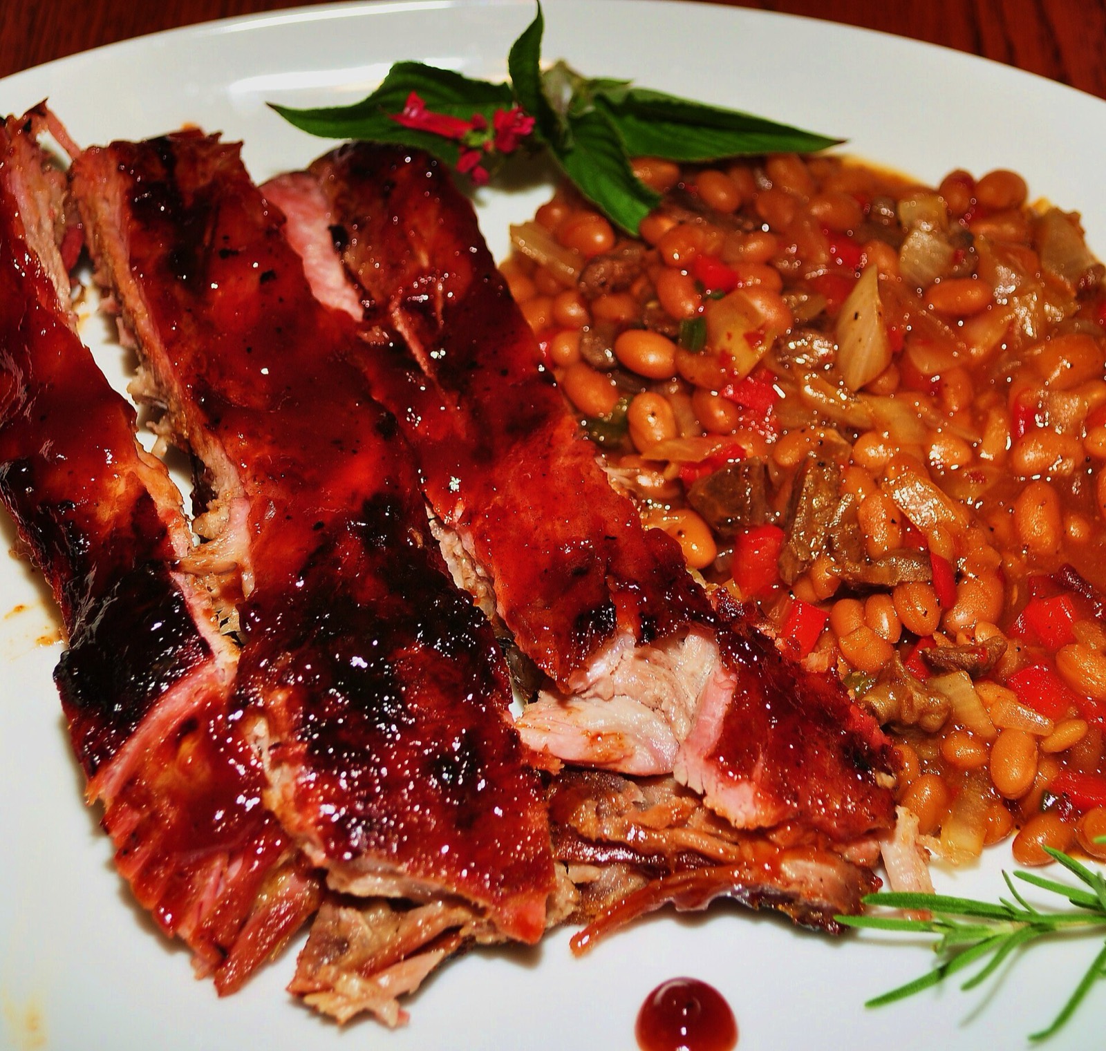 Racks of glazed barbecue pork ribs