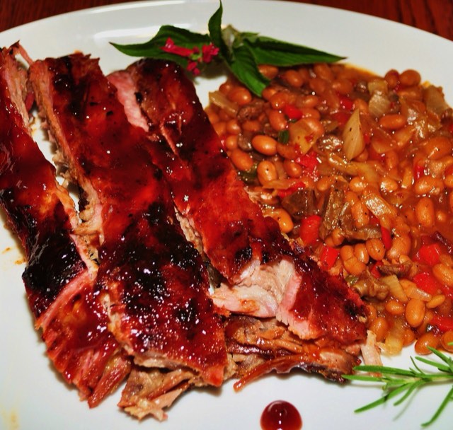Racks of glazed barbecue pork ribs