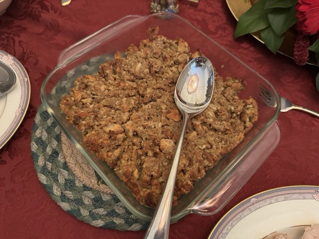 Savory bread stuffing in a casserole dish
